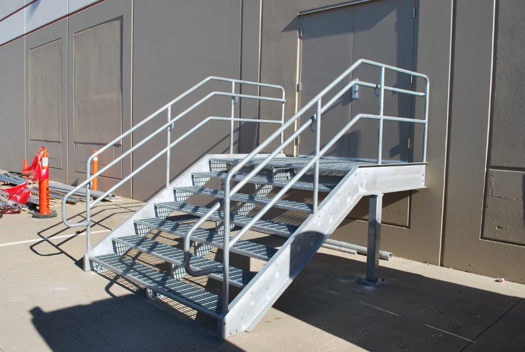 Galvanized dock stair mounted to exterir door