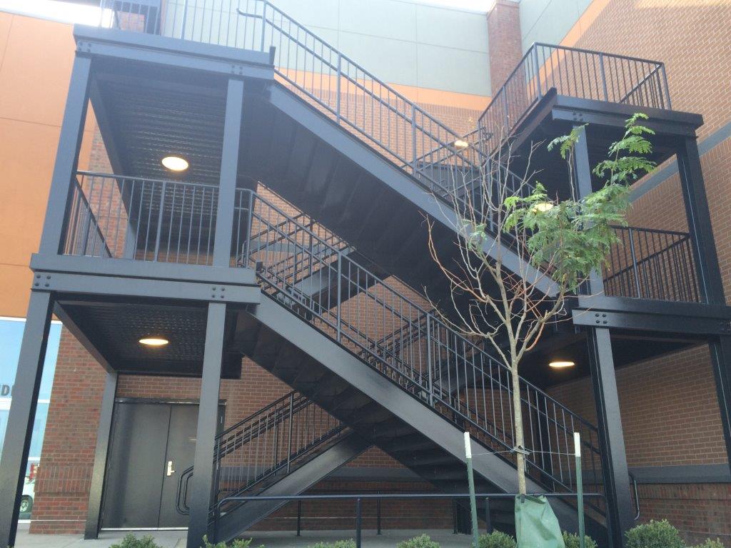 Large black multi-level exterior steel staircase
