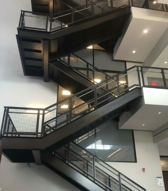 3 story open steel staircase in office building